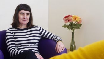 Seated female counsellor Seated female counsellor